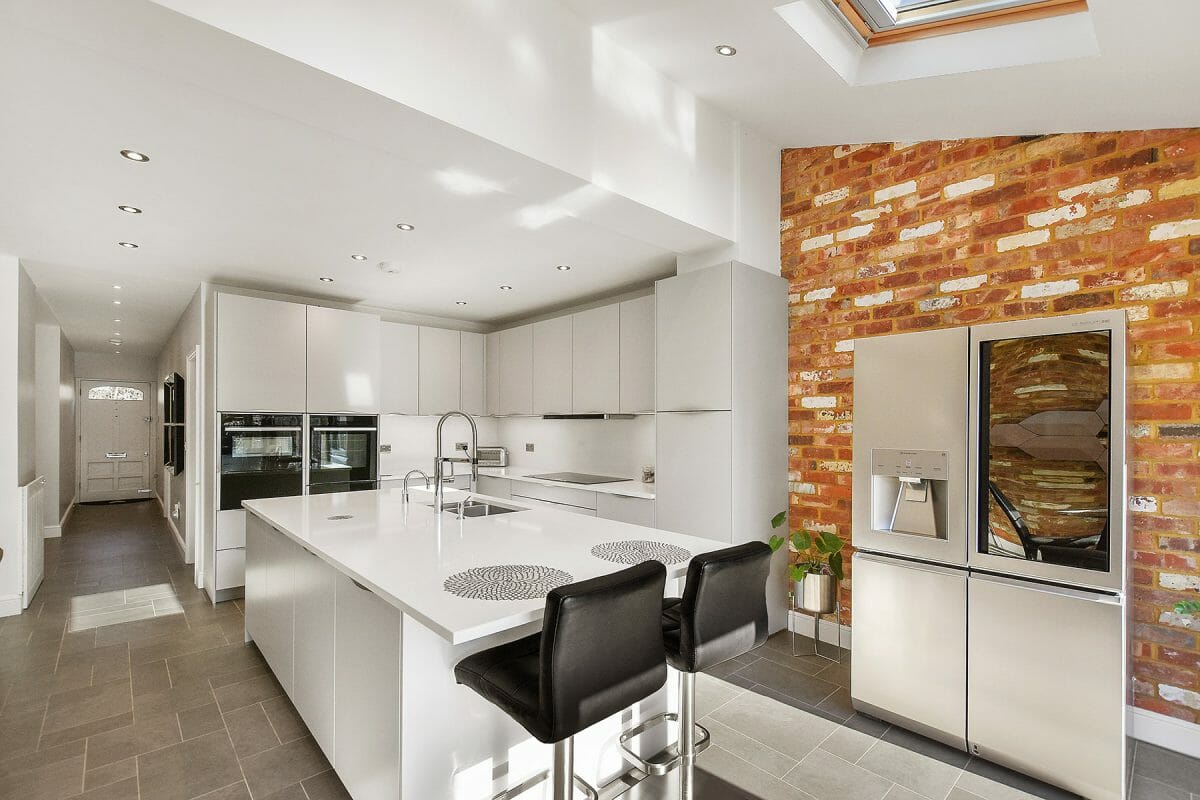 All white modern kitchen with island