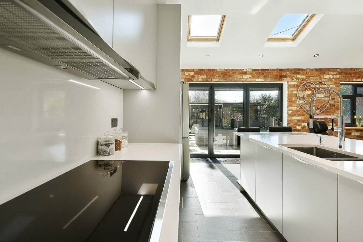 All white modern kitchen with island