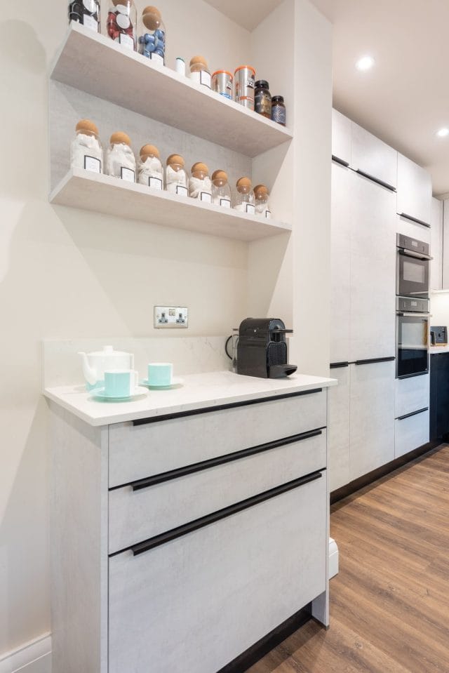 Sophisticated Nolte Kitchen with White Concrete and Black Ash