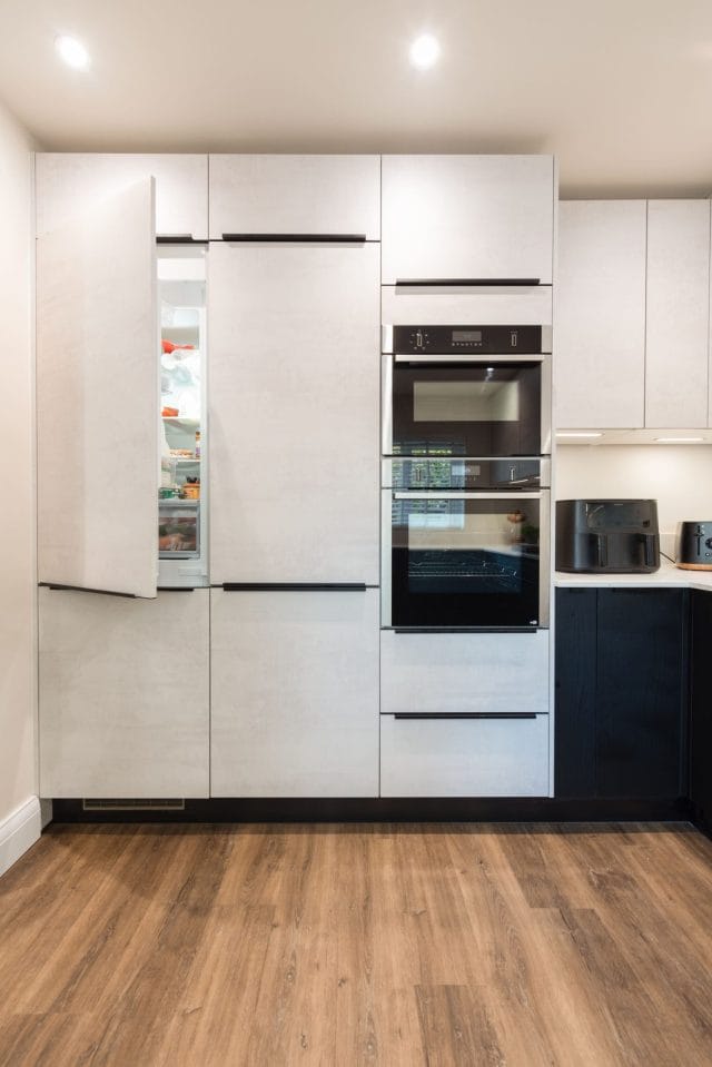 Sophisticated Nolte Kitchen with White Concrete and Black Ash