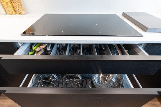 Sophisticated Nolte Kitchen with White Concrete and Black Ash