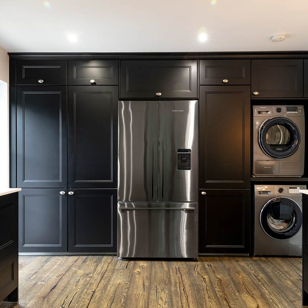 Ebstones Kitchens - Monochrome Shaker Kitchen Fridge with cabinets and washing appliances